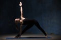 Beautiful Yoga Woman Doing Extended Triangle Pose