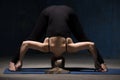 Beautiful Yoga Woman standing in Wide-Legged Forward Bend Pose Royalty Free Stock Photo