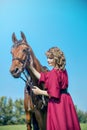 Beautiful yong womanl and horse Royalty Free Stock Photo