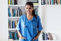 Beautiful young adult spanish female nurse or medical student Royalty Free Stock Photo