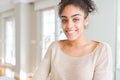 Beautiful young african american woman with afro hair with a happy and cool smile on face Royalty Free Stock Photo