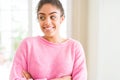 Beautiful young african american woman with afro hair smiling looking side and staring away thinking Royalty Free Stock Photo