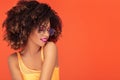 Beauty portrait of afro girl in fashionable eyeglasses Royalty Free Stock Photo