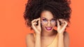 Beauty portrait of afro girl in fashionable eyeglasses Royalty Free Stock Photo