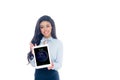 beautiful young african american woman holding ipad tablet and smiling at camera isolated