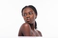 Beautiful Young african Female touching Her Skin isolated on white background. Healthcare. Perfect Skin. Beauty Face Royalty Free Stock Photo