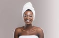 Beautiful young african woman wrapped in white bath towel Royalty Free Stock Photo