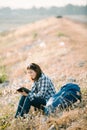 Beautiful young Asia woman writing on a journal report