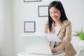 Beautiful young asian business woman using laptop computer working from home for video conference online. Royalty Free Stock Photo