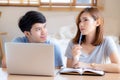 Beautiful young asian couple calculate expenses finance with laptop and planning together