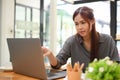 Beautiful young asian female graphic designer working at her creative workspace Royalty Free Stock Photo