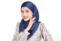 Beautiful young asian muslim woman wearing a blue hijab on white background, Portrait of Arab Beauty