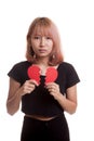 Beautiful young Asian woman with broken heart. Royalty Free Stock Photo