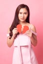 Beautiful young Asian woman with broken heart Royalty Free Stock Photo