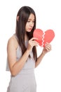 Beautiful young Asian woman with broken heart Royalty Free Stock Photo