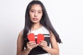 Beautiful young Asian woman with broken heart Royalty Free Stock Photo