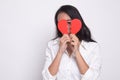 Beautiful young Asian woman with broken heart Royalty Free Stock Photo