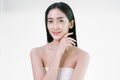 Beautiful young Asian woman healthy with skin natural makeup and clean fresh skin with touching her cheek with her hand.Facial Royalty Free Stock Photo