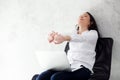 Beautiful young asian woman with laptop stretch and exercise relax after work success. Royalty Free Stock Photo