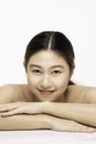 Beautiful Young Asian Woman looking at camera smile feeling so happy and cheerful with healthy Clean and Fresh skin Royalty Free Stock Photo