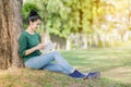 Beautiful young asian woman reading book Royalty Free Stock Photo