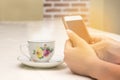 Beautiful young asian woman sitting on chair relaxing coffee tim Royalty Free Stock Photo