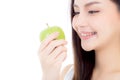 Beautiful young asian woman smile and holding green apple fruit with wellness and healthy isolated Royalty Free Stock Photo