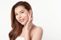 Beautiful young asian woman smiling and applying face cream on white background, Skin care and rejuvenation, Face care, Facial Royalty Free Stock Photo