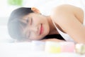 Beautiful of young asian woman smiling and lying on bed at bedroom, beauty of girl with hygiene and healthy. Royalty Free Stock Photo