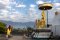 Beautiful young Asian woman traveler tourist respect and praying the old Buddha statue at Phrae, Thailand. Journey travel concept Royalty Free Stock Photo