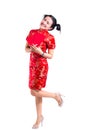Beautiful Young asian woman wearing chinese dress traditional cheongsam or qipao. Look at and Smile many red envelopes Royalty Free Stock Photo