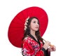 Beautiful young asian woman wearing kimono with red umbrella. Royalty Free Stock Photo