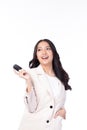 Beautiful young Asian woman wearing suit feeling happy and smile holding the keys of the car on white background Royalty Free Stock Photo