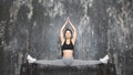 Beautiful young asian Woman Working Out, doing Pilates Exercise in Sportswear. Splits with Yoga Asana, Stretching Royalty Free Stock Photo