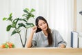 Beautiful young asian woman writing diary or story from home Royalty Free Stock Photo