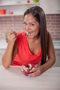 Beautiful young Asian women eating fruit salad Royalty Free Stock Photo