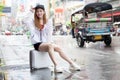 beautiful Young Asian women tourist traveler smiling in sitting