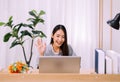 Beautiful young asian woman using video conference call to people,Work from home,Work at home