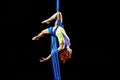 Beautiful young athletic girl dancing in the air with balance. Royalty Free Stock Photo