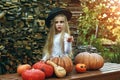 Beautiful young baby girl in witch costume outdoors. Royalty Free Stock Photo