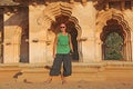 A beautiful and young bald tourist man in Hampi, on a background