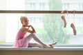 Beautiful young ballerina in ballet class. Royalty Free Stock Photo