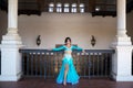 Beautiful young belly dancer is posing for the camera in a photo shoot. The woman is beautiful and dressed in traditional clothes Royalty Free Stock Photo