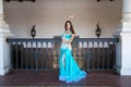 Beautiful young belly dancer is posing for the camera in a photo shoot. The woman is beautiful and dressed in traditional clothes Royalty Free Stock Photo