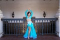 Beautiful young belly dancer is posing for the camera in a photo shoot. The woman is beautiful and dressed in traditional clothes Royalty Free Stock Photo
