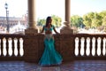 Beautiful young belly dancer is posing for the camera in a photo shoot. The woman is beautiful and dressed in traditional clothes Royalty Free Stock Photo