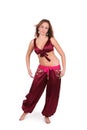 Beautiful young belly dancer in red costume Royalty Free Stock Photo
