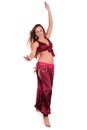 Beautiful young belly dancer in red costume Royalty Free Stock Photo