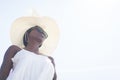 Beautiful young black African American woman on tropical beach