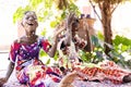 Beautiful young black African women celebrating new year and chrismas party while blowing confetti decorations to camera